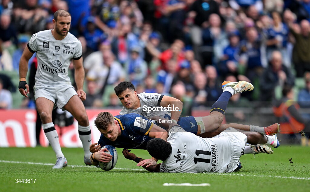 2 May 2026; Garry Ringrose of Leinster dives over to score his side's third try despite the efforts of Tomas Albornoz, top, and Setariki Tuicuvu of RC Toulon during the Investec Champions Cup semi-final match between Leinster and RC Toulon at the Aviva Stadium in Dublin. Photo by Sam Barnes/Sportsfile