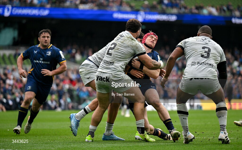 2 May 2026; Josh van der Flier of Leinster is tackled by Teddy Baubigny of RC Toulon, 2, during the Investec Champions Cup semi-final match between Leinster and RC Toulon at the Aviva Stadium in Dublin. Photo by Sam Barnes/Sportsfile