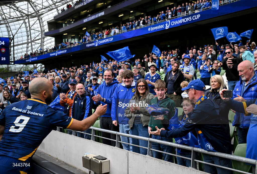 2 May 2026; Jamison Gibson-Park of Leinster gifts his boots to Leinster supporter Beau Cassidy, from Blackrock in Dublin after the Investec Champions Cup semi-final match between Leinster and RC Toulon at the Aviva Stadium in Dublin. Photo by Sam Barnes/Sportsfile
