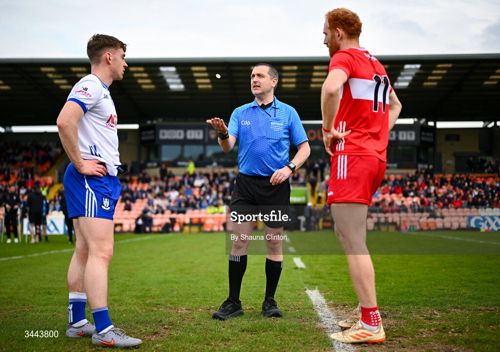 2 May 2026; Referee Noel Mooney, centre, is joined by Monaghan captain Micheal Bannigan, left, and Derry captain Conor Glass for the coin toss ahead of the Ulster GAA Football Senior Championship semi-final match between Derry and Monaghan at BOX-IT Athletic Grounds in Armagh. Photo by Shauna Clinton/Sportsfile