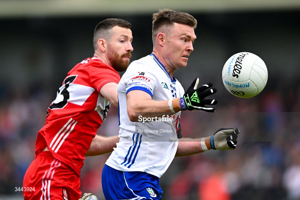 2 May 2026; Conor McCarthy of Monaghan is tackled by Niall Loughlin of Derry during the Ulster GAA Football Senior Championship semi-final match between Derry and Monaghan at BOX-IT Athletic Grounds in Armagh. Photo by Shauna Clinton/Sportsfile
