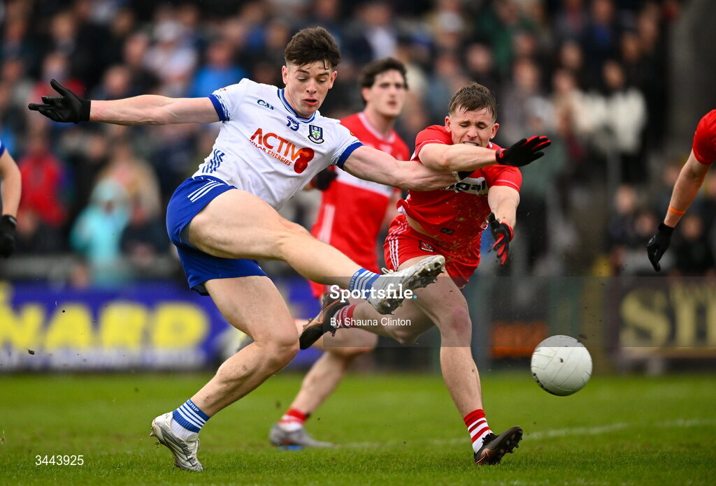 2 May 2026; Bobby McCaul of Monaghan has a shot on goal despite the efforts of Ruairi Forbes of Derry during the Ulster GAA Football Senior Championship semi-final match between Derry and Monaghan at BOX-IT Athletic Grounds in Armagh. Photo by Shauna Clinton/Sportsfile