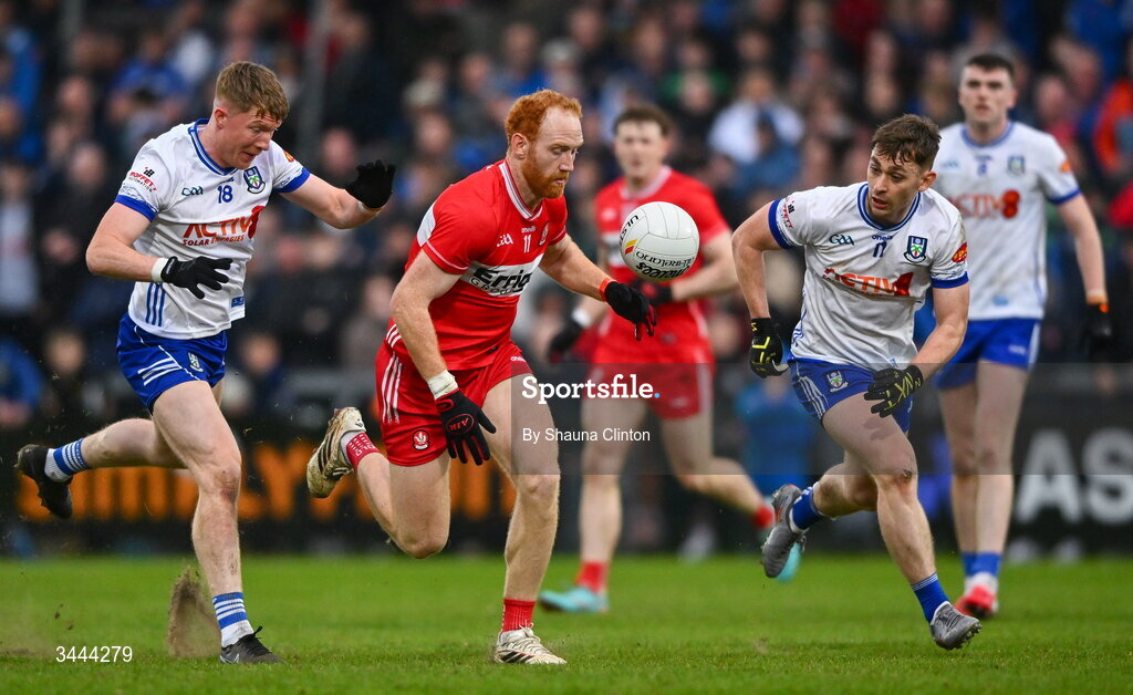 2 May 2026; Conor Glass of Derry in action against Monaghan players Ryan Duffy, left, and Micheal Bannigan during the Ulster GAA Football Senior Championship semi-final match between Derry and Monaghan at BOX-IT Athletic Grounds in Armagh. Photo by Shauna Clinton/Sportsfile