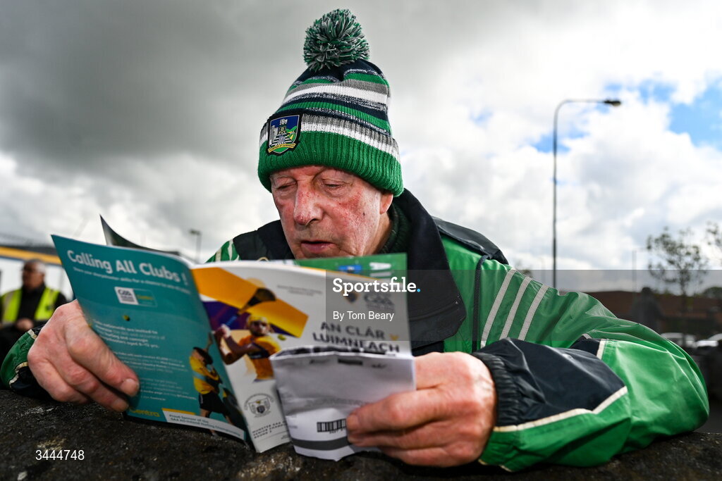 3 May 2026; Limerick supporter Jack Dillon from Galbally reads his match programme as he awaits the turnstiles to be opened before the Munster GAA Senior Hurling Championship Round 3 match between Clare and Limerick at Zimmer Biomet Páirc Chíosóg in Ennis, Clare. Photo by Tom Beary/Sportsfile