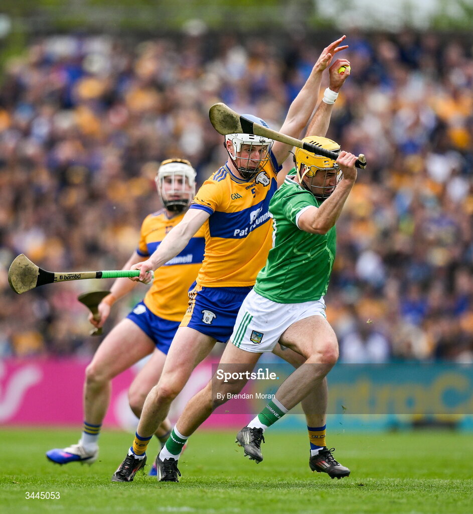 3 May 2026; Cathal O’Neill of Limerick is tackled by Diarmuid Ryan of Clare during the Munster GAA Senior Hurling Championship Round 3 match between Clare and Limerick at Zimmer Biomet Páirc Chíosóg in Ennis, Clare. Photo by Brendan Moran/Sportsfile