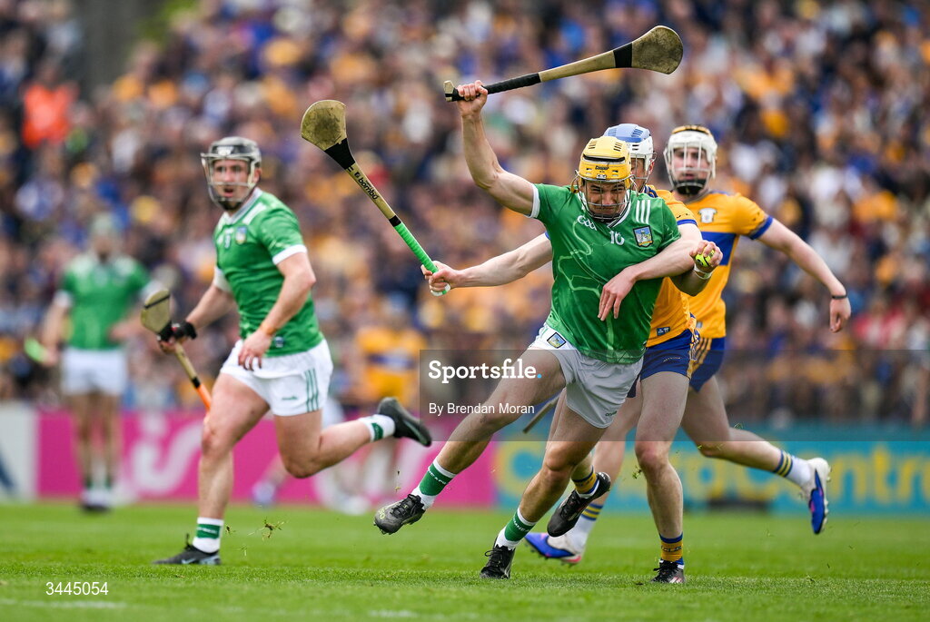 3 May 2026; Cathal O’Neill of Limerick is tackled by Diarmuid Ryan of Clare during the Munster GAA Senior Hurling Championship Round 3 match between Clare and Limerick at Zimmer Biomet Páirc Chíosóg in Ennis, Clare. Photo by Brendan Moran/Sportsfile