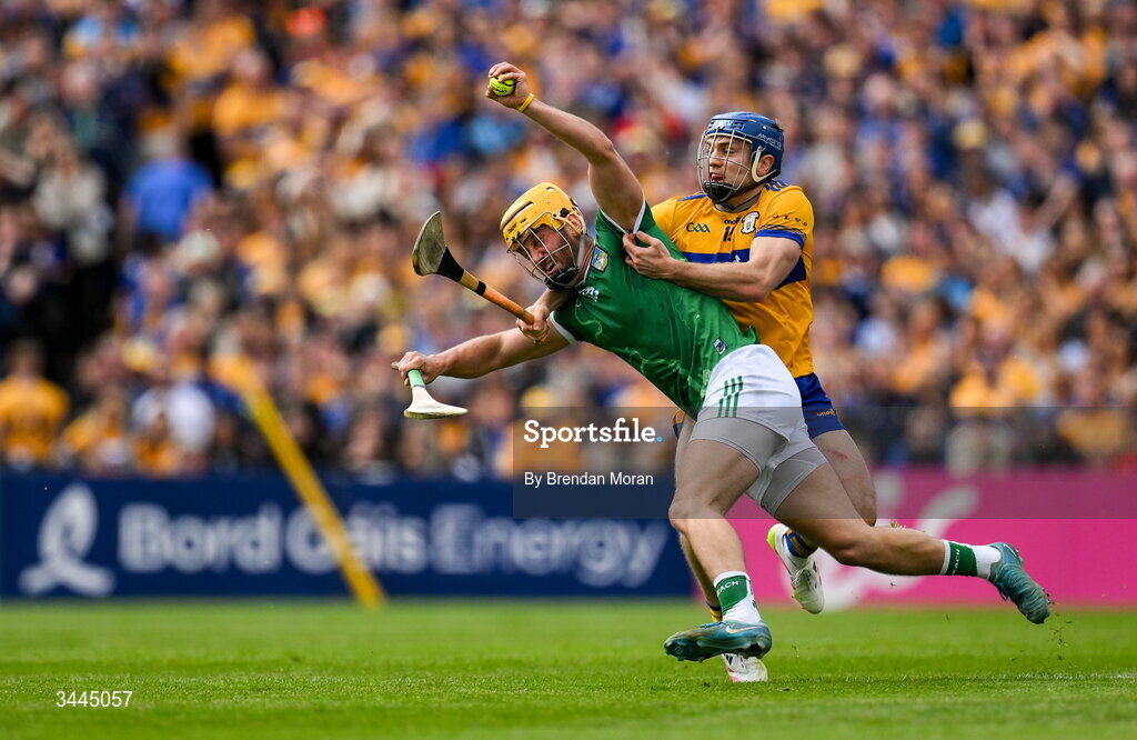 3 May 2026; Tom Morrissey of Limerick is tackled by Shane O'Donnell of Clare during the Munster GAA Senior Hurling Championship Round 3 match between Clare and Limerick at Zimmer Biomet Páirc Chíosóg in Ennis, Clare. Photo by Brendan Moran/Sportsfile