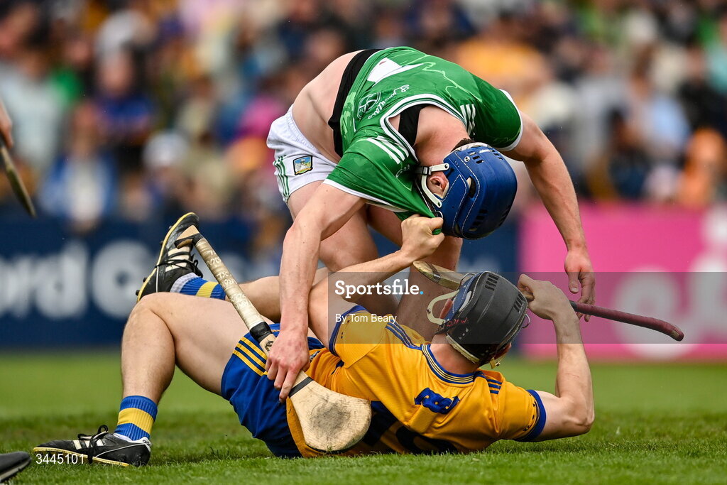 3 May 2026; Shane O'Brien of Limerick tussels with David McInerney of Clare during the Munster GAA Senior Hurling Championship Round 3 match between Clare and Limerick at Zimmer Biomet Páirc Chíosóg in Ennis, Clare. Photo by Tom Beary/Sportsfile