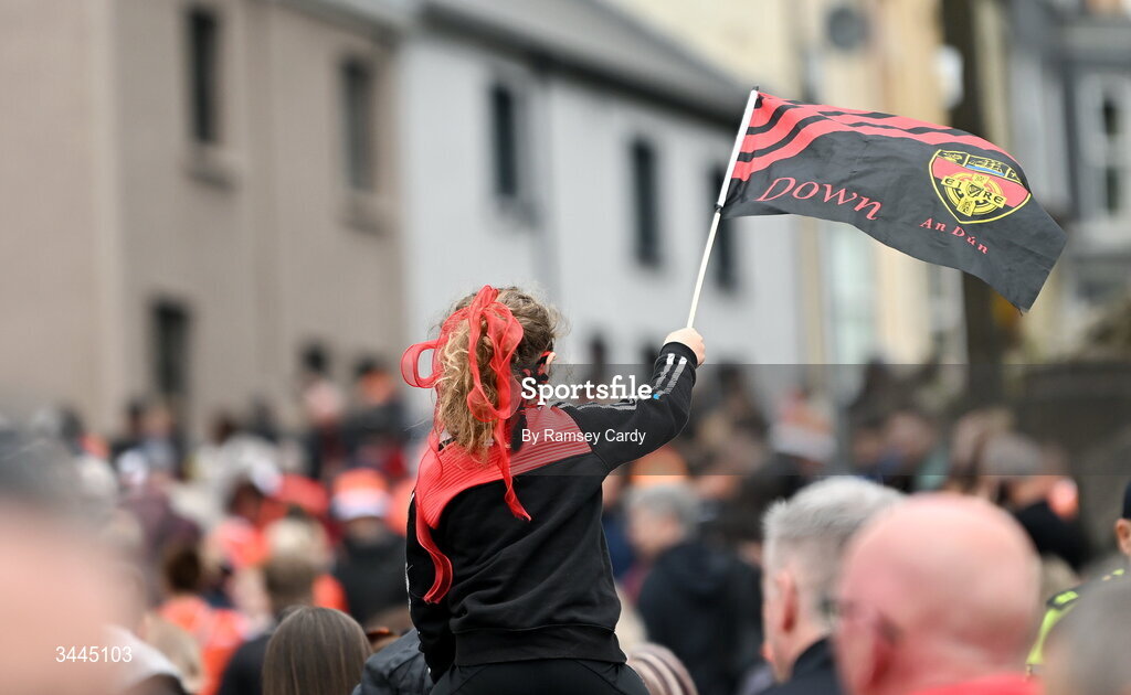 3 May 2026; A Down supporter makes their way to the ground before the Ulster GAA Football Senior Championship semi-final match between Armagh and Down at St Tiernach's Park in Clones, Monaghan. Photo by Ramsey Cardy/Sportsfile