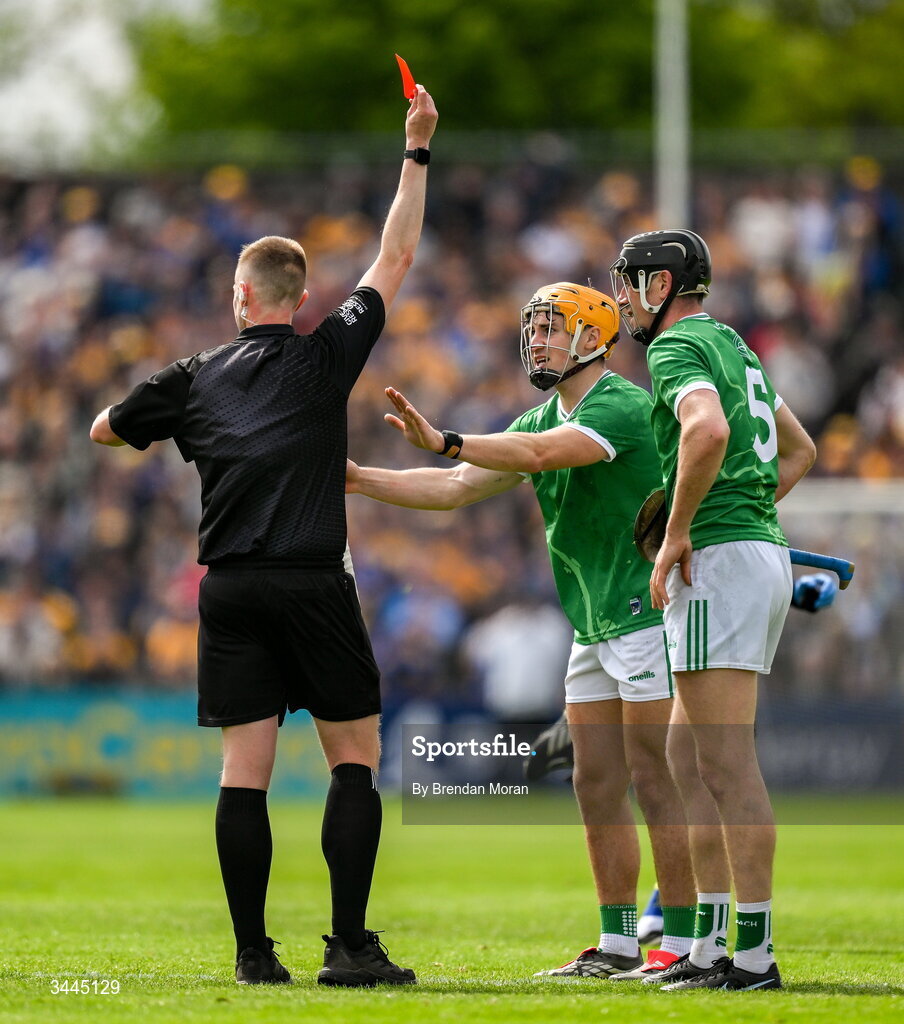 3 May 2026; Adam English of Limerick is shown a red card after a second yellow card, by referee Michael Kennedy during the Munster GAA Senior Hurling Championship Round 3 match between Clare and Limerick at Zimmer Biomet Páirc Chíosóg in Ennis, Clare. Photo by Brendan Moran/Sportsfile