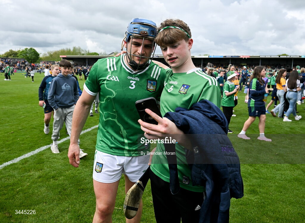 3 May 2026; Mike Casey of Limerick poses for a selfie with a supporter after the Munster GAA Senior Hurling Championship Round 3 match between Clare and Limerick at Zimmer Biomet Páirc Chíosóg in Ennis, Clare. Photo by Brendan Moran/Sportsfile