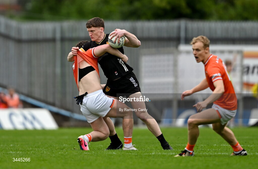 3 May 2026; Odhran Murdock of Down in action against Tiernan Kelly of Armagh during the Ulster GAA Football Senior Championship semi-final match between Armagh and Down at St Tiernach's Park in Clones, Monaghan. Photo by Ramsey Cardy/Sportsfile
