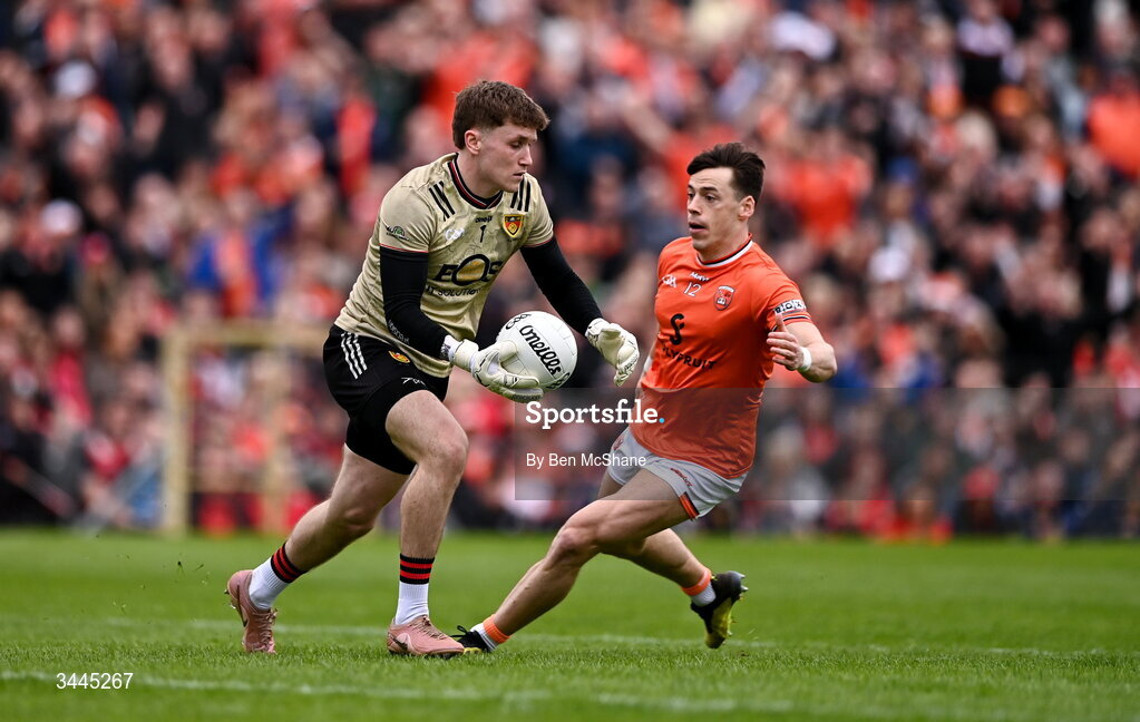 3 May 2026; Down goalkeeper Ronan Burns in action against Tomas McCormack of Armagh during the Ulster GAA Football Senior Championship semi-final match between Armagh and Down at St Tiernach's Park in Clones, Monaghan. Photo by Ben McShane/Sportsfile