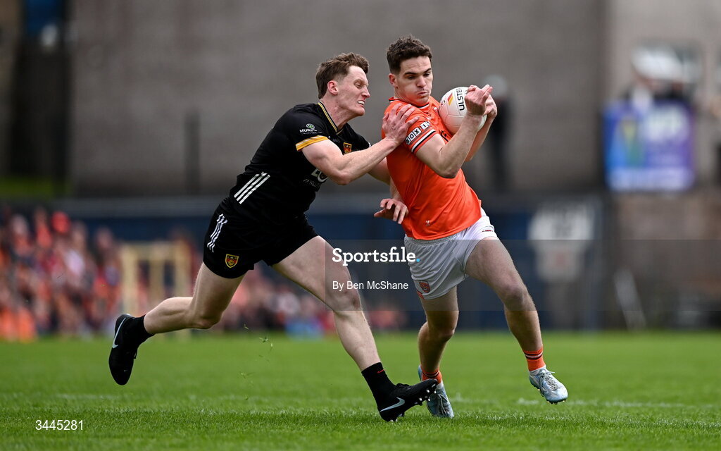 3 May 2026; Jarly Og Burns of Armagh is tackled by Odhran Murdock of Down during the Ulster GAA Football Senior Championship semi-final match between Armagh and Down at St Tiernach's Park in Clones, Monaghan. Photo by Ben McShane/Sportsfile