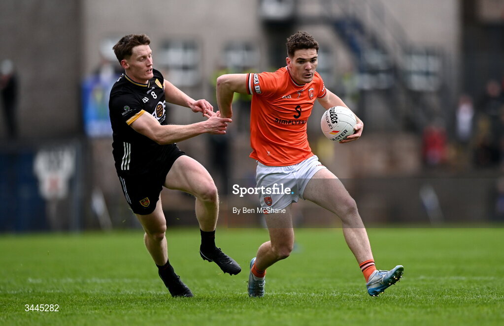 3 May 2026; Jarly Og Burns of Armagh is tackled by Odhran Murdock of Down during the Ulster GAA Football Senior Championship semi-final match between Armagh and Down at St Tiernach's Park in Clones, Monaghan. Photo by Ben McShane/Sportsfile