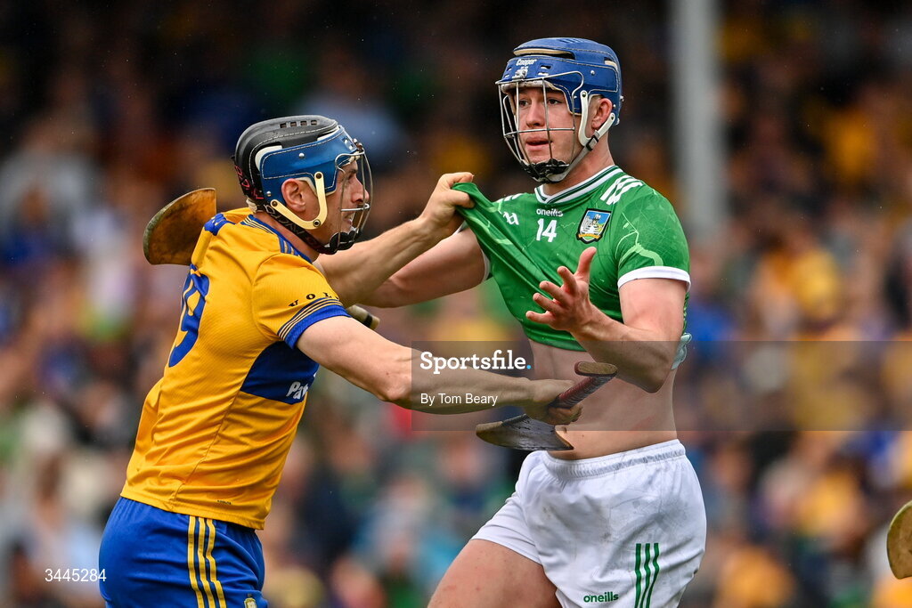3 May 2026; Shane O'Brien of Limerick tussles with David McInerney of Clare during the Munster GAA Senior Hurling Championship Round 3 match between Clare and Limerick at Zimmer Biomet Páirc Chíosóg in Ennis, Clare. Photo by Tom Beary/Sportsfile