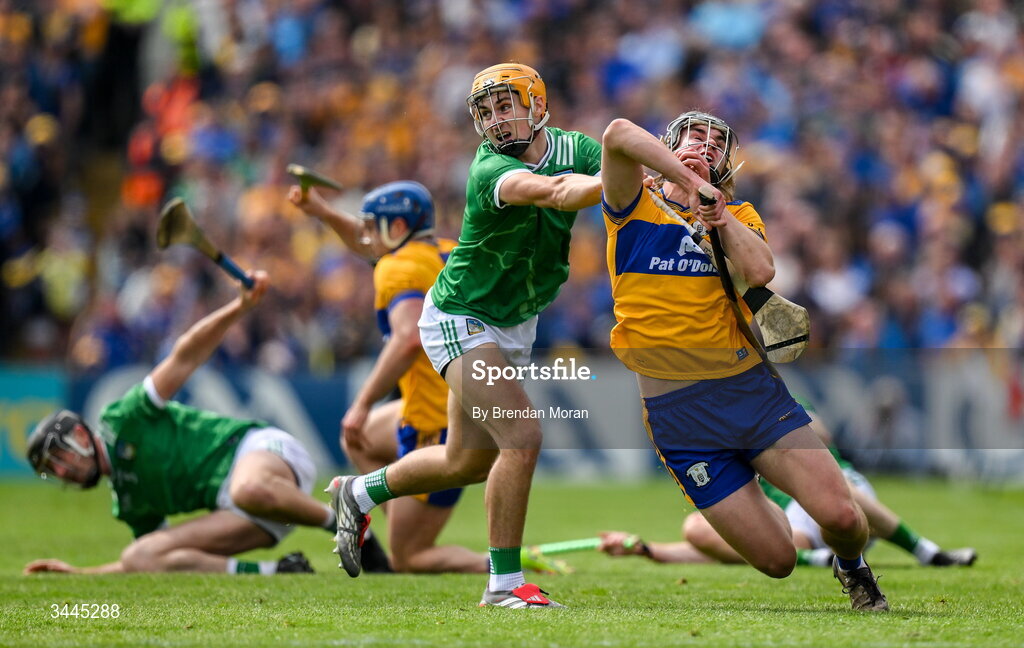 3 May 2026; Diarmuid Stritch of Clare is tackled by Adam English of Limerick, resulting in a second yellow card, and subsequently a red card for Adam English, during the Munster GAA Senior Hurling Championship Round 3 match between Clare and Limerick at Zimmer Biomet Páirc Chíosóg in Ennis, Clare. Photo by Brendan Moran/Sportsfile