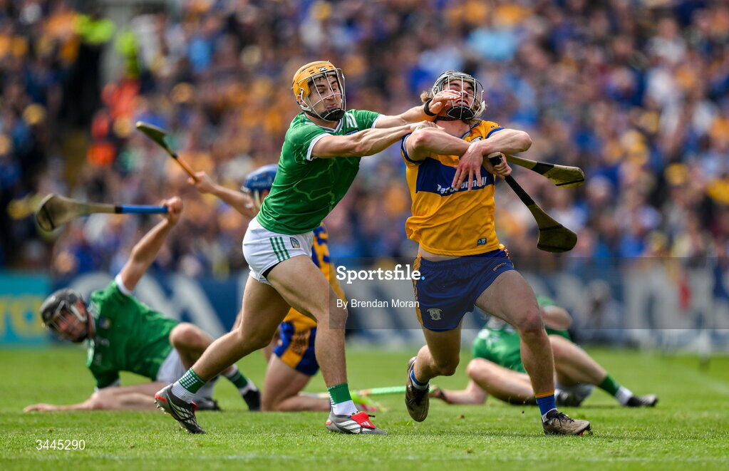 3 May 2026; Diarmuid Stritch of Clare is tackled by Adam English of Limerick, resulting in a second yellow card, and subsequently a red card for Adam English, during the Munster GAA Senior Hurling Championship Round 3 match between Clare and Limerick at Zimmer Biomet Páirc Chíosóg in Ennis, Clare. Photo by Brendan Moran/Sportsfile