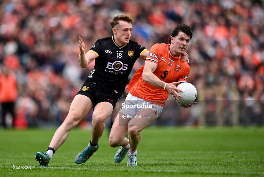 3 May 2026; Joe McElroy of Armagh is tackled by Liam Kerr of Down during the Ulster GAA Football Senior Championship semi-final match between Armagh and Down at St Tiernach's Park in Clones, Monaghan. Photo by Ben McShane/Sportsfile