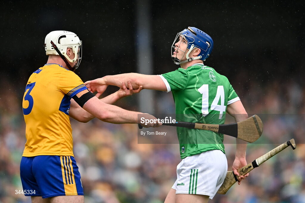 3 May 2026; Shane O'Brien of Limerick tussels with Conor Cleary of Clare during the Munster GAA Senior Hurling Championship Round 3 match between Clare and Limerick at Zimmer Biomet Páirc Chíosóg in Ennis, Clare. Photo by Tom Beary/Sportsfile
