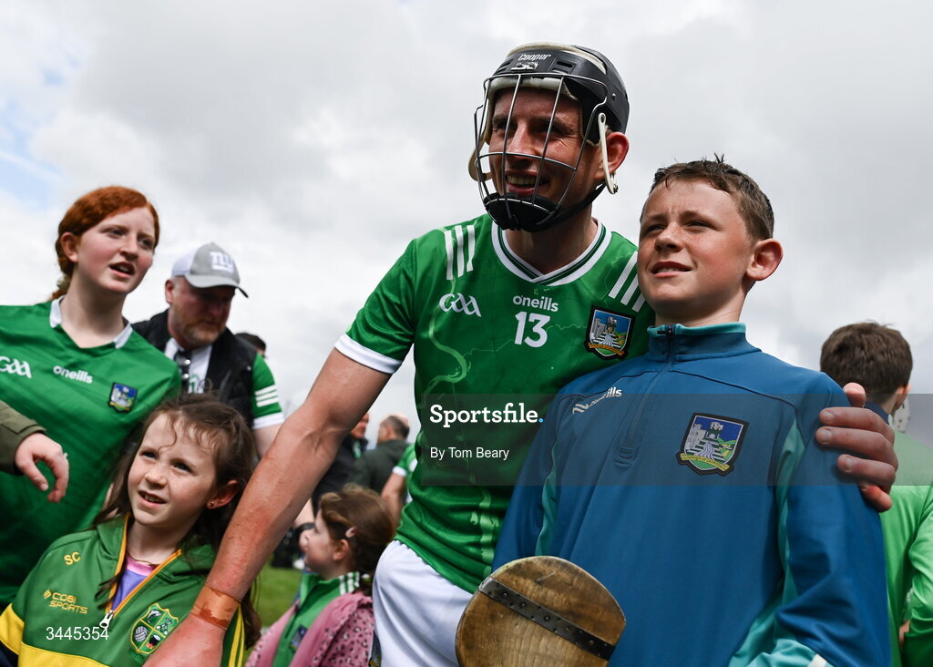 3 May 2026; Gearóid Hegarty of Limerick poses for a photo with a supporter after the Munster GAA Senior Hurling Championship Round 3 match between Clare and Limerick at Zimmer Biomet Páirc Chíosóg in Ennis, Clare. Photo by Tom Beary/Sportsfile