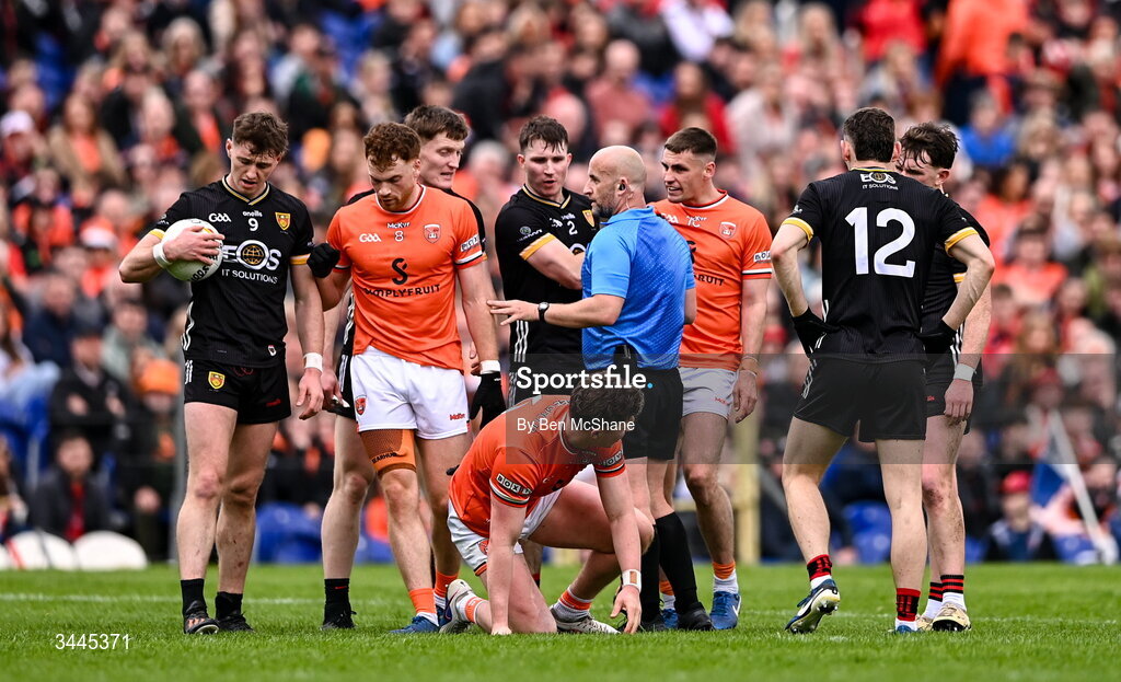 3 May 2026; Referee Brendan Cawley brings order as players of both side's tussle during the Ulster GAA Football Senior Championship semi-final match between Armagh and Down at St Tiernach's Park in Clones, Monaghan. Photo by Ben McShane/Sportsfile