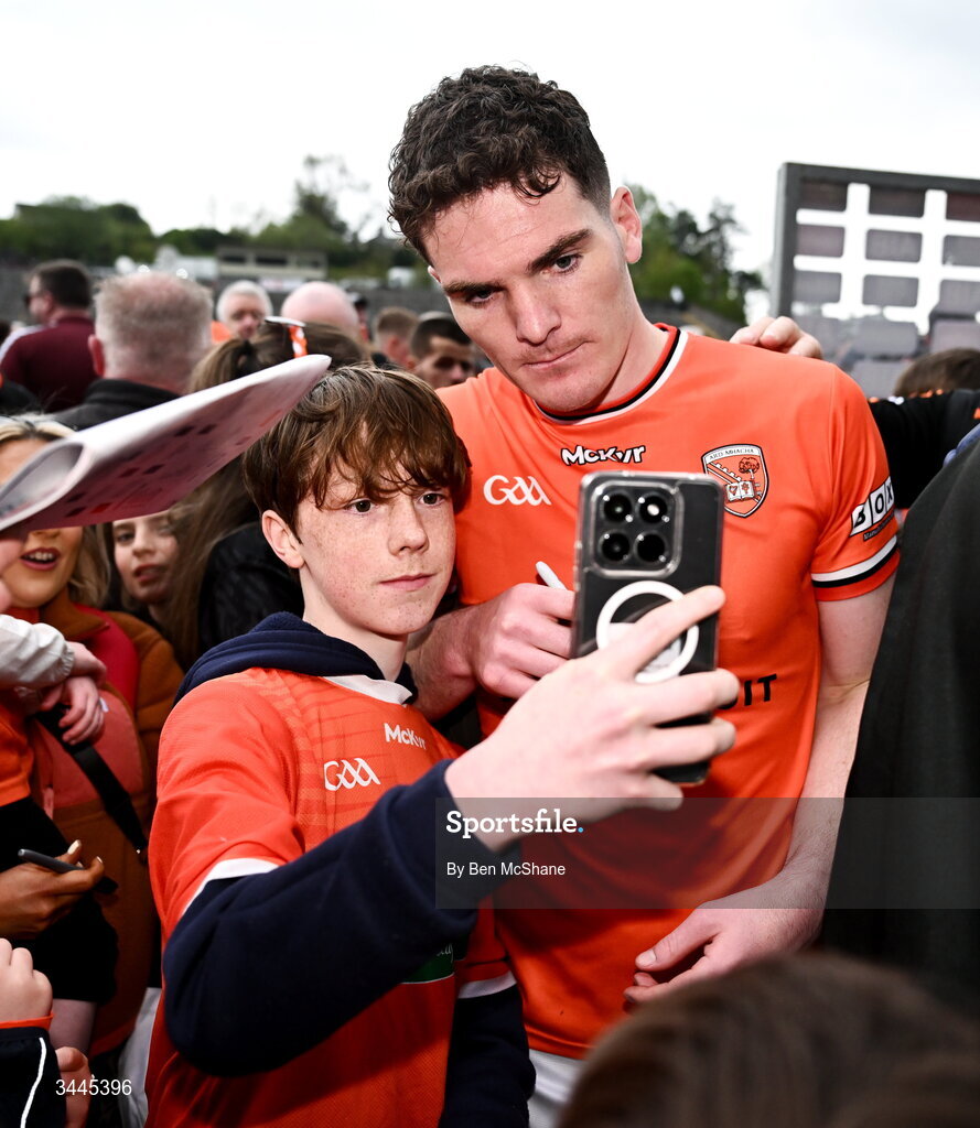 3 May 2026; Jarly Og Burns of Armagh with supporters after the Ulster GAA Football Senior Championship semi-final match between Armagh and Down at St Tiernach's Park in Clones, Monaghan. Photo by Ben McShane/Sportsfile