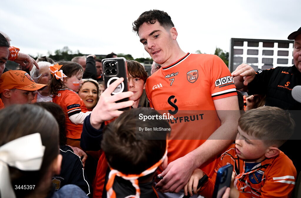 3 May 2026; Jarly Og Burns of Armagh with supporters after the Ulster GAA Football Senior Championship semi-final match between Armagh and Down at St Tiernach's Park in Clones, Monaghan. Photo by Ben McShane/Sportsfile