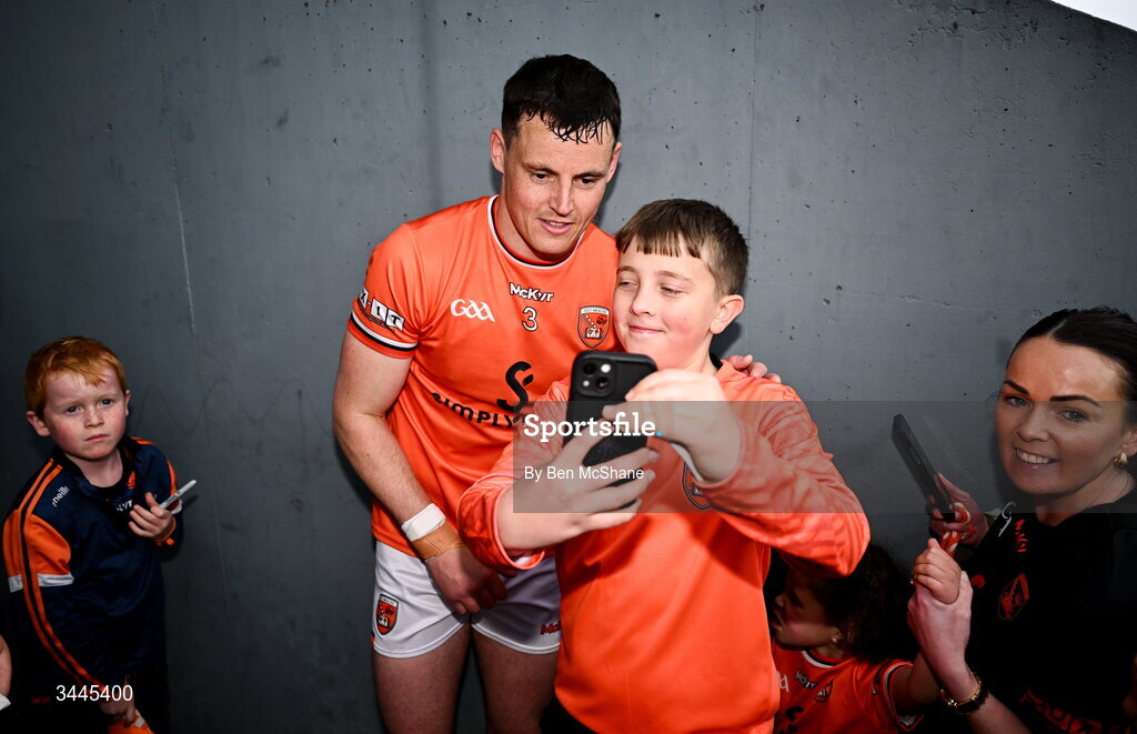 3 May 2026; Aaron McKay of Armagh with a supporters after the Ulster GAA Football Senior Championship semi-final match between Armagh and Down at St Tiernach's Park in Clones, Monaghan. Photo by Ben McShane/Sportsfile