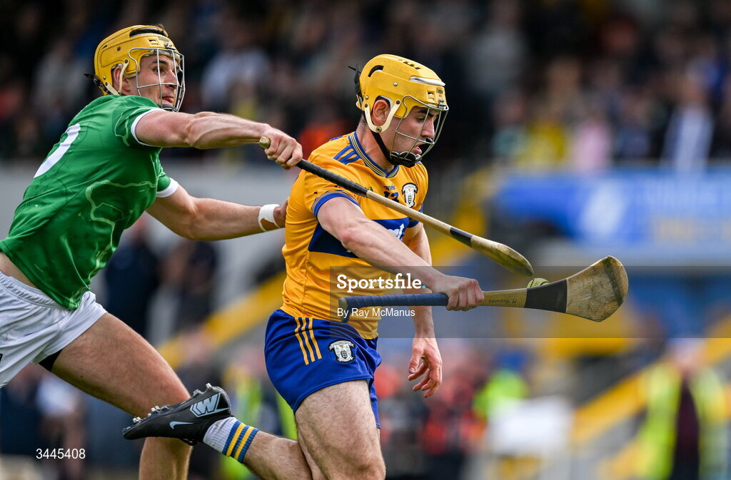 3 May 2026; Mark Rodgers of Clare is tackled by Cathal O'Neill of Limerick during the Munster GAA Senior Hurling Championship Round 3 match between Clare and Limerick at Zimmer Biomet Páirc Chíosóg in Ennis, Clare. Photo by Ray McManus/Sportsfile