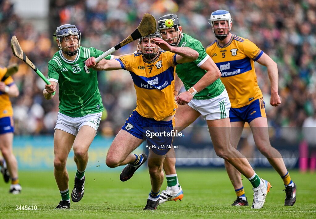 3 May 2026; Cathal Malone of Clare, with Diarmuid Ryan in support, is tackled by David Reidy , left, and Peter Casey of Limerick during the Munster GAA Senior Hurling Championship Round 3 match between Clare and Limerick at Zimmer Biomet Páirc Chíosóg in Ennis, Clare. Photo by Ray McManus/Sportsfile