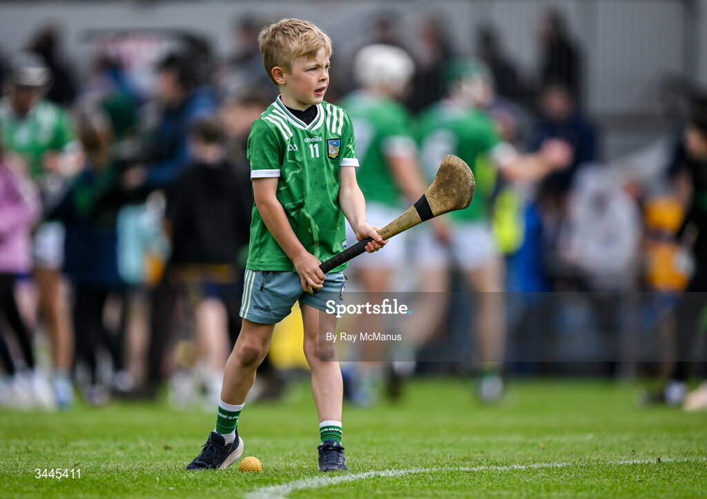 3 May 2026; Limerick supporter, nine year old, Fionn Fitzgerald from Galbally prepares to tahe a 'free' as he practices his skills after the Munster GAA Senior Hurling Championship Round 3 match between Clare and Limerick at Zimmer Biomet Páirc Chíosóg in Ennis, Clare. Photo by Ray McManus/Sportsfile