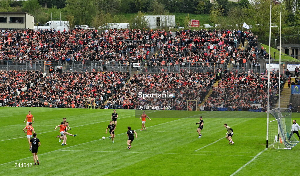 3 May 2026; Conor Turbitt of Armagh shoots to score his side's third goal past Down goalkeeper Ronan Burns during the Ulster GAA Football Senior Championship semi-final match between Armagh and Down at St Tiernach's Park in Clones, Monaghan. Photo by Ramsey Cardy/Sportsfile