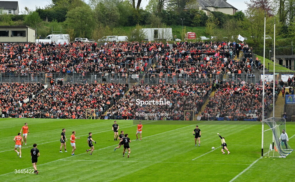 3 May 2026; Conor Turbitt of Armagh shoots to score his side's third goal past Down goalkeeper Ronan Burns during the Ulster GAA Football Senior Championship semi-final match between Armagh and Down at St Tiernach's Park in Clones, Monaghan. Photo by Ramsey Cardy/Sportsfile