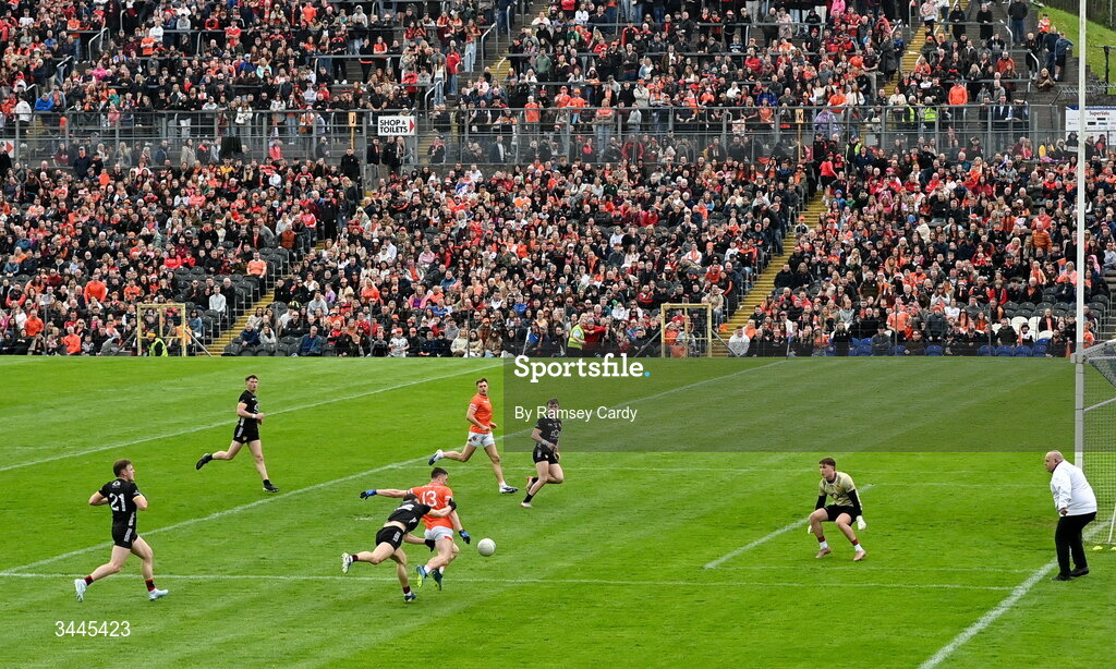3 May 2026; Oisin Conaty of Armagh is fouled by Pearse McPolin of Down during the Ulster GAA Football Senior Championship semi-final match between Armagh and Down at St Tiernach's Park in Clones, Monaghan. Photo by Ramsey Cardy/Sportsfile