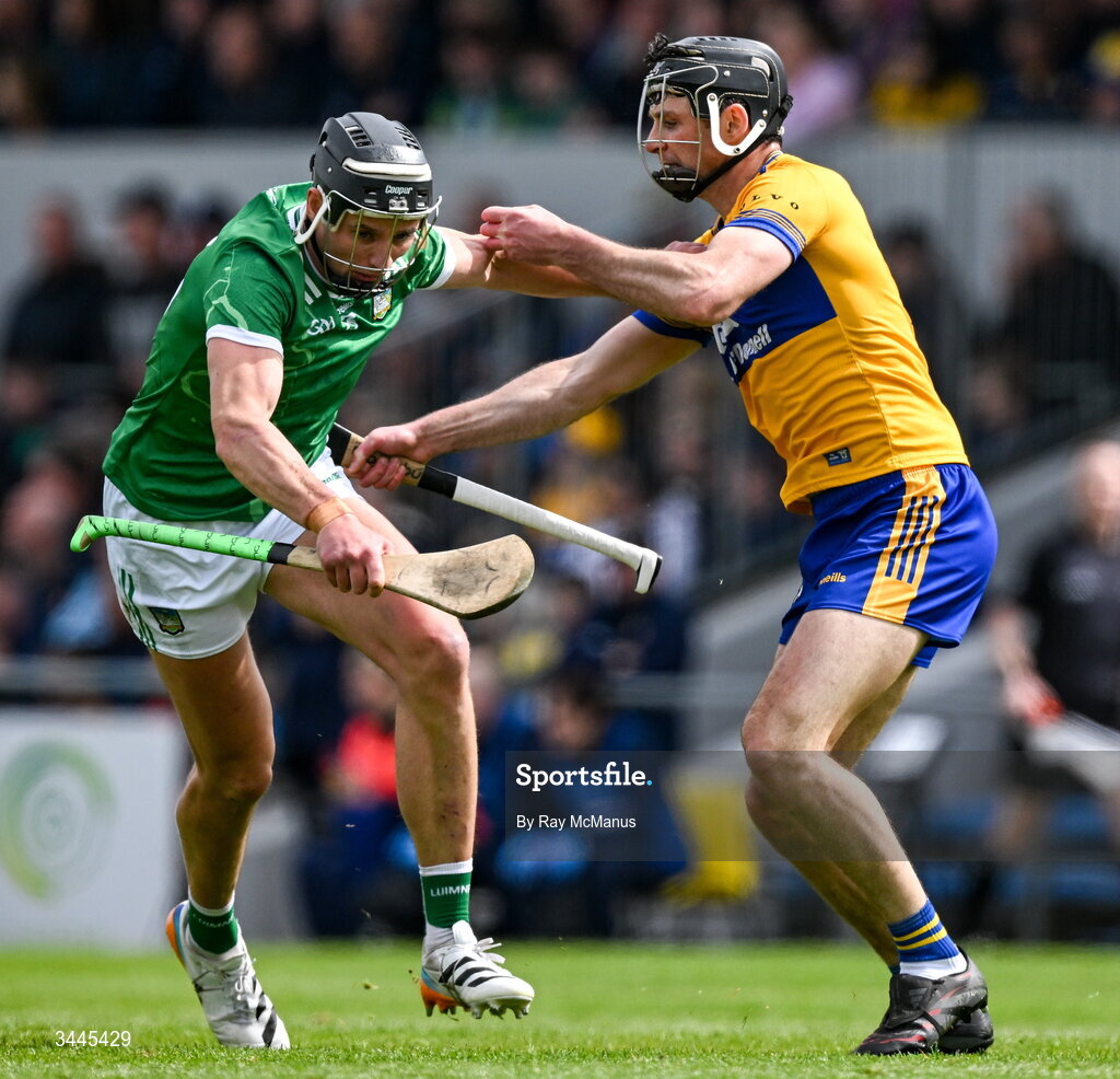 3 May 2026; Gearóid Hegarty of Limerick is tackled by Cathal Malone of Clare during the Munster GAA Senior Hurling Championship Round 3 match between Clare and Limerick at Zimmer Biomet Páirc Chíosóg in Ennis, Clare. Photo by Ray McManus/Sportsfile