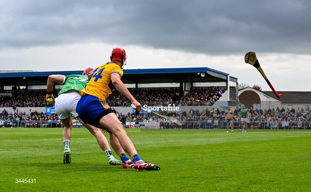 3 May 2026; Barry Nash of Limerick loses his hurl as he is tackled by Peter Duggan of Clare during the Munster GAA Senior Hurling Championship Round 3 match between Clare and Limerick at Zimmer Biomet Páirc Chíosóg in Ennis, Clare. Photo by Ray McManus/Sportsfile