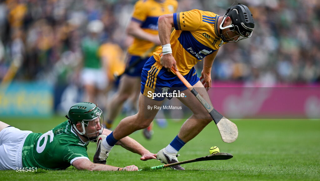 3 May 2026; David Reidy of Clare is tackled by William O'Donoghue of Limerick during the Munster GAA Senior Hurling Championship Round 3 match between Clare and Limerick at Zimmer Biomet Páirc Chíosóg in Ennis, Clare. Photo by Ray McManus/Sportsfile