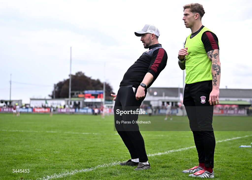 3 May 2026; Westmeath manager Mark McHugh, left, and injured Westmeath footballer Luke Loughlin during the Leinster GAA Football Senior Championship semi-final match between Kildare and Westmeath at Glenisk O'Connor Park in Tullamore, Offaly. Photo by Piaras Ó Mídheach/Sportsfile