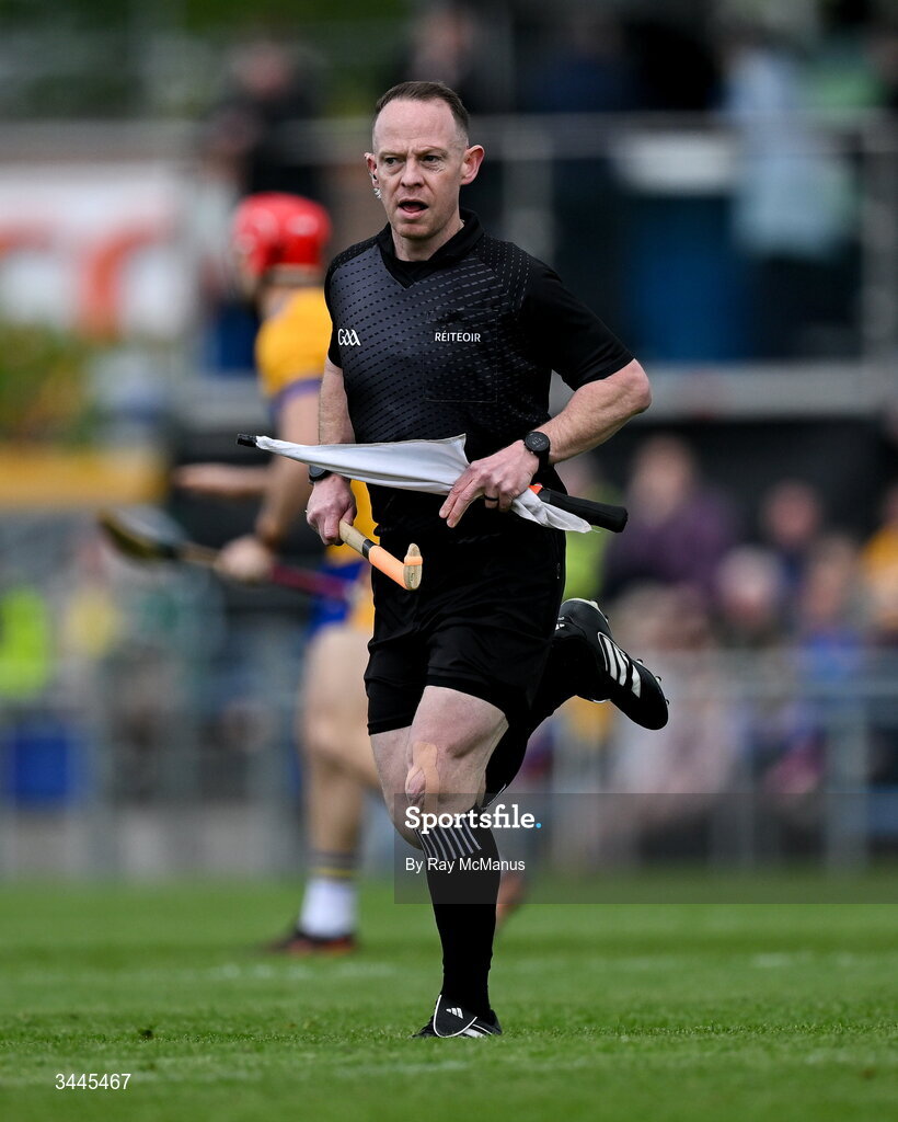 3 May 2026; Line umpire and standby referee removes a broken hurley during the Munster GAA Senior Hurling Championship Round 3 match between Clare and Limerick at Zimmer Biomet Páirc Chíosóg in Ennis, Clare. Photo by Ray McManus/Sportsfile
