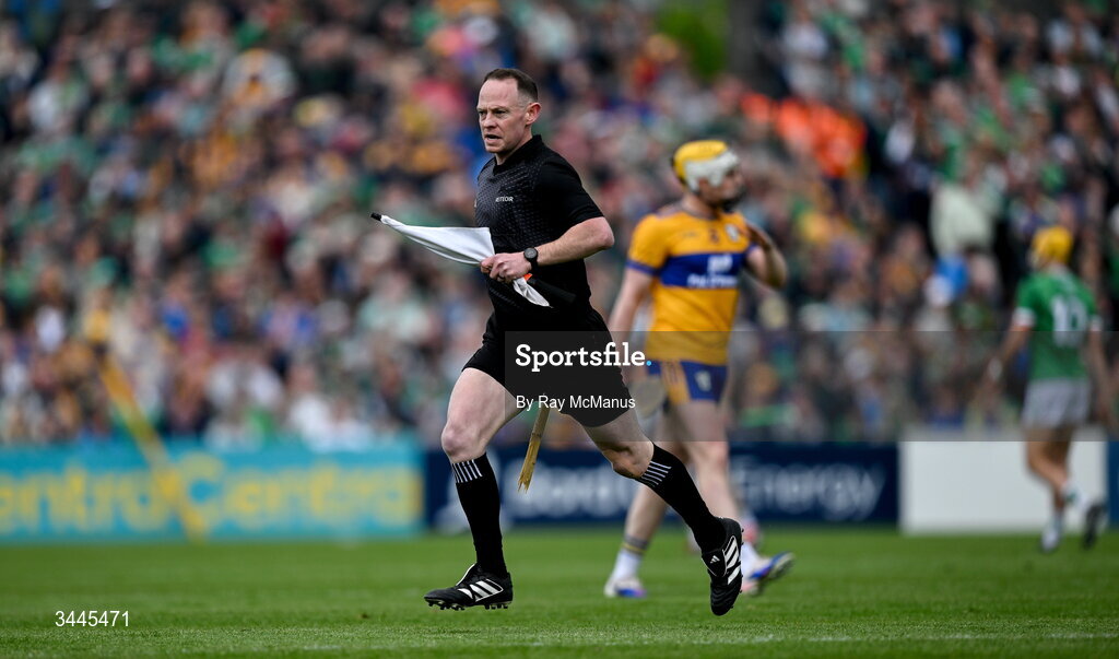 3 May 2026; Line umpire and standby referee removes a broken hurley during the Munster GAA Senior Hurling Championship Round 3 match between Clare and Limerick at Zimmer Biomet Páirc Chíosóg in Ennis, Clare. Photo by Ray McManus/Sportsfile