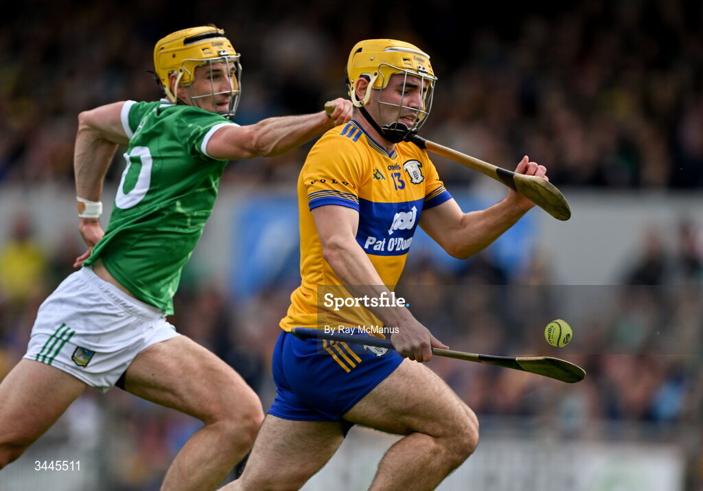 3 May 2026; Mark Rodgers of Clare is tackled by Cathal O'Neill of Limerick during the Munster GAA Senior Hurling Championship Round 3 match between Clare and Limerick at Zimmer Biomet Páirc Chíosóg in Ennis, Clare. Photo by Ray McManus/Sportsfile