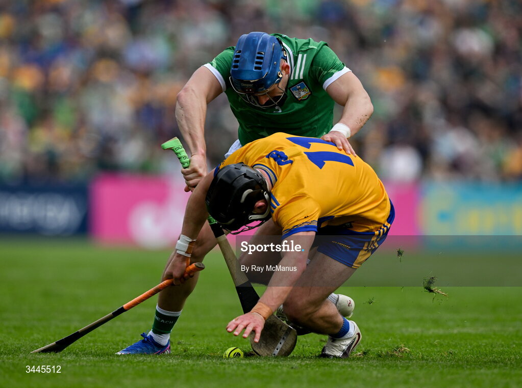 3 May 2026; David Reidy of Clare is tackled by Mike Casey of Limerick during the Munster GAA Senior Hurling Championship Round 3 match between Clare and Limerick at Zimmer Biomet Páirc Chíosóg in Ennis, Clare. Photo by Ray McManus/Sportsfile