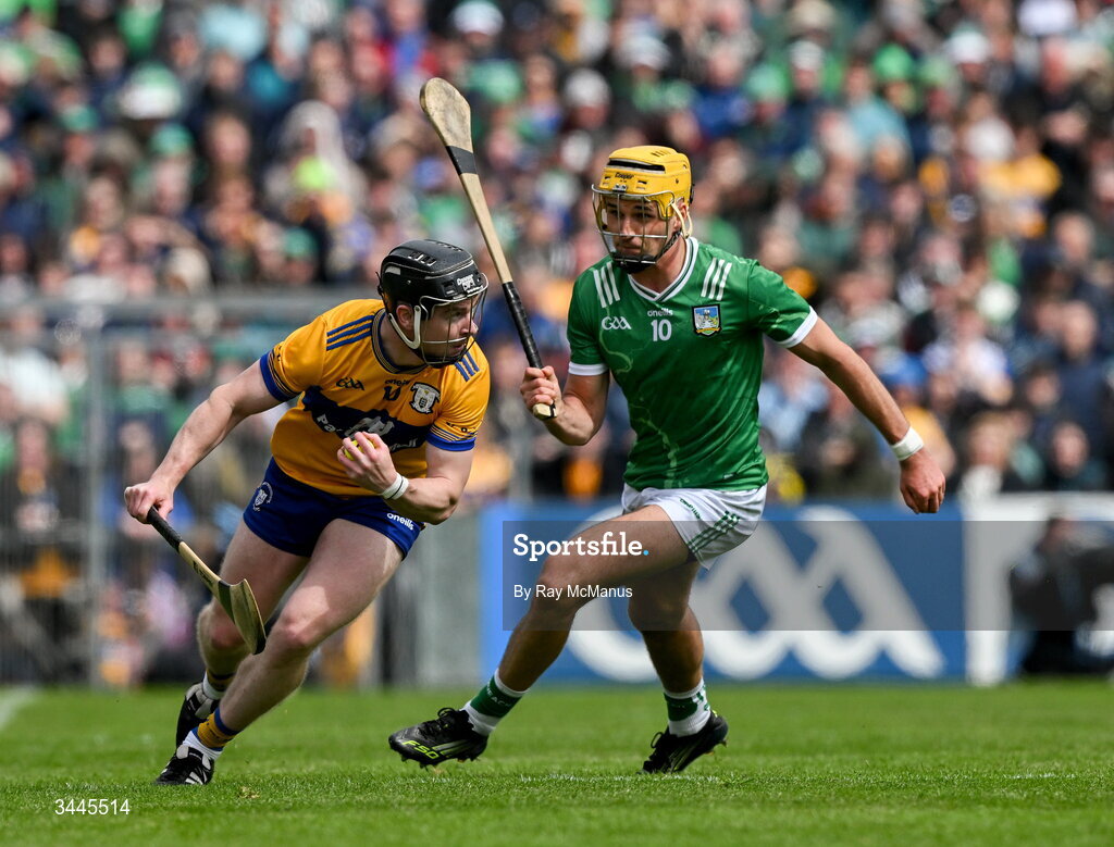3 May 2026; Tony Kelly of Clare is tackled by Cathal O'Neill of Limerick during the Munster GAA Senior Hurling Championship Round 3 match between Clare and Limerick at Zimmer Biomet Páirc Chíosóg in Ennis, Clare. Photo by Ray McManus/Sportsfile