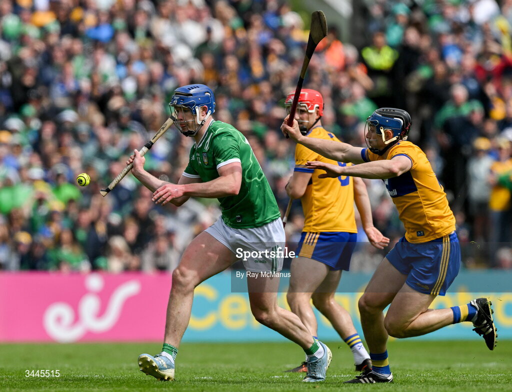 3 May 2026; Shane O'Brien of Limerick is tackled by David McInerney of Clare during the Munster GAA Senior Hurling Championship Round 3 match between Clare and Limerick at Zimmer Biomet Páirc Chíosóg in Ennis, Clare. Photo by Ray McManus/Sportsfile
