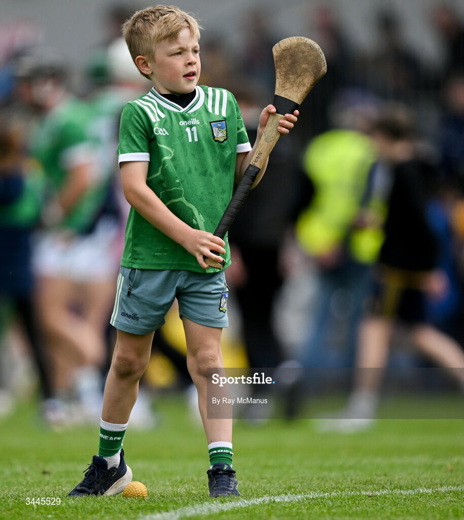3 May 2026; Limerick supporter, nine year old, Fionn Fitzgerald from Galbally prepares to take a 'free' as he practices his skills after the Munster GAA Senior Hurling Championship Round 3 match between Clare and Limerick at Zimmer Biomet Páirc Chíosóg in Ennis, Clare. Photo by Ray McManus/Sportsfile