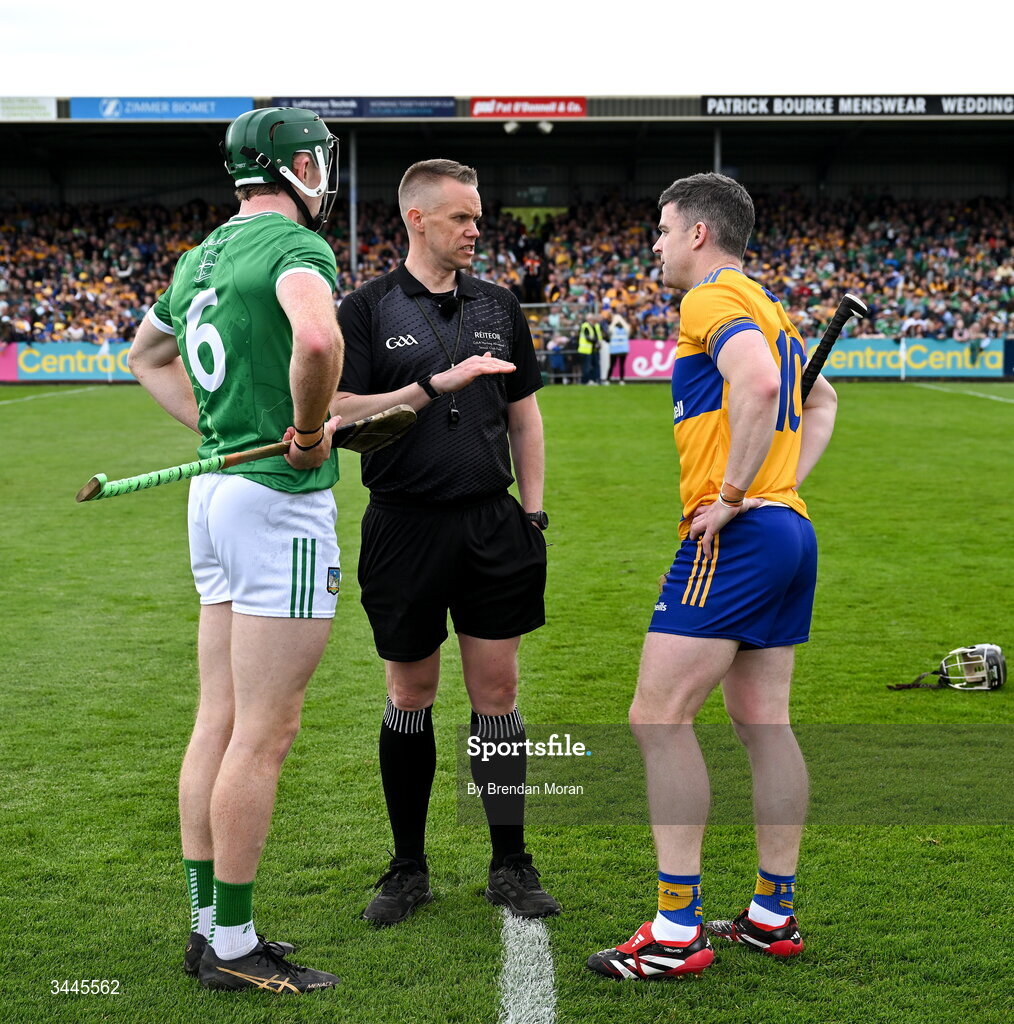 3 May 2026; Referee Michael Kennedy speaks to team captains William O'Donoghue of Limerick and Tony Kelly of Clare before the Munster GAA Senior Hurling Championship Round 3 match between Clare and Limerick at Zimmer Biomet Páirc Chíosóg in Ennis, Clare. Photo by Brendan Moran/Sportsfile