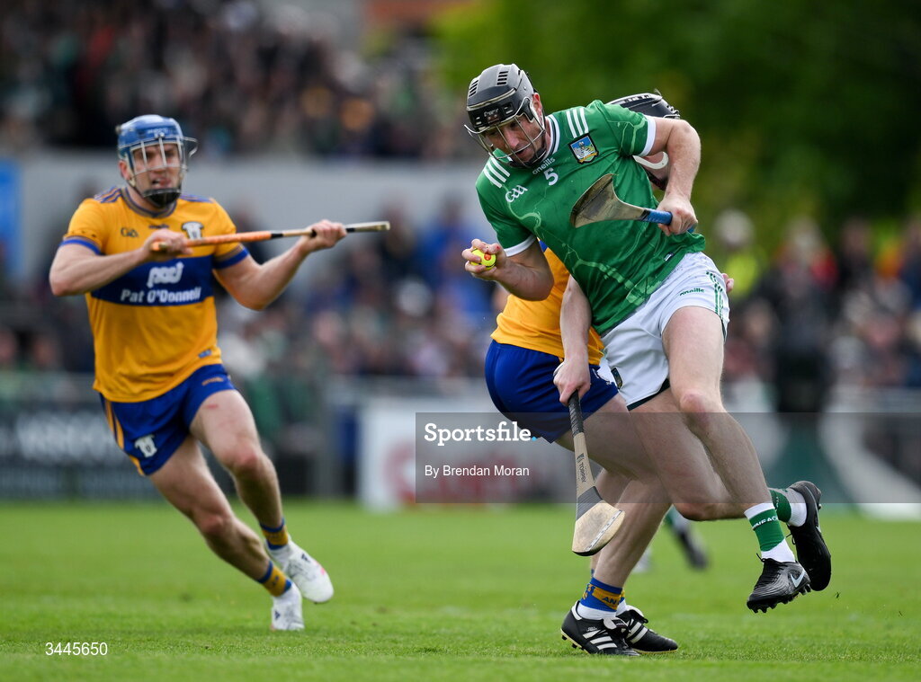 3 May 2026; Diarmaid Byrnes of Limerick is tackled by Tony Kelly of Clare during the Munster GAA Senior Hurling Championship Round 3 match between Clare and Limerick at Zimmer Biomet Páirc Chíosóg in Ennis, Clare. Photo by Brendan Moran/Sportsfile
