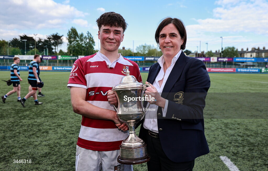 4 May 2026; President of Leinster Rugby Moira Flahive presents the U17 Culliton Cup to Tullow RFC captain Cathal Mallin during the Leinster Rugby Youth Boys Cup Finals at Energia Park in Dublin. Photo by Thomas Flinkow/Sportsfile