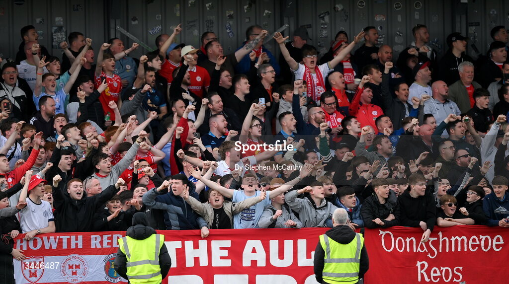 4 May 2026; Shelbourne supporters celebrate during the SSE Airtricity Men's Premier Division match between Bohemians and Shelbourne at Dalymount Park in Dublin. Photo by Stephen McCarthy/Sportsfile